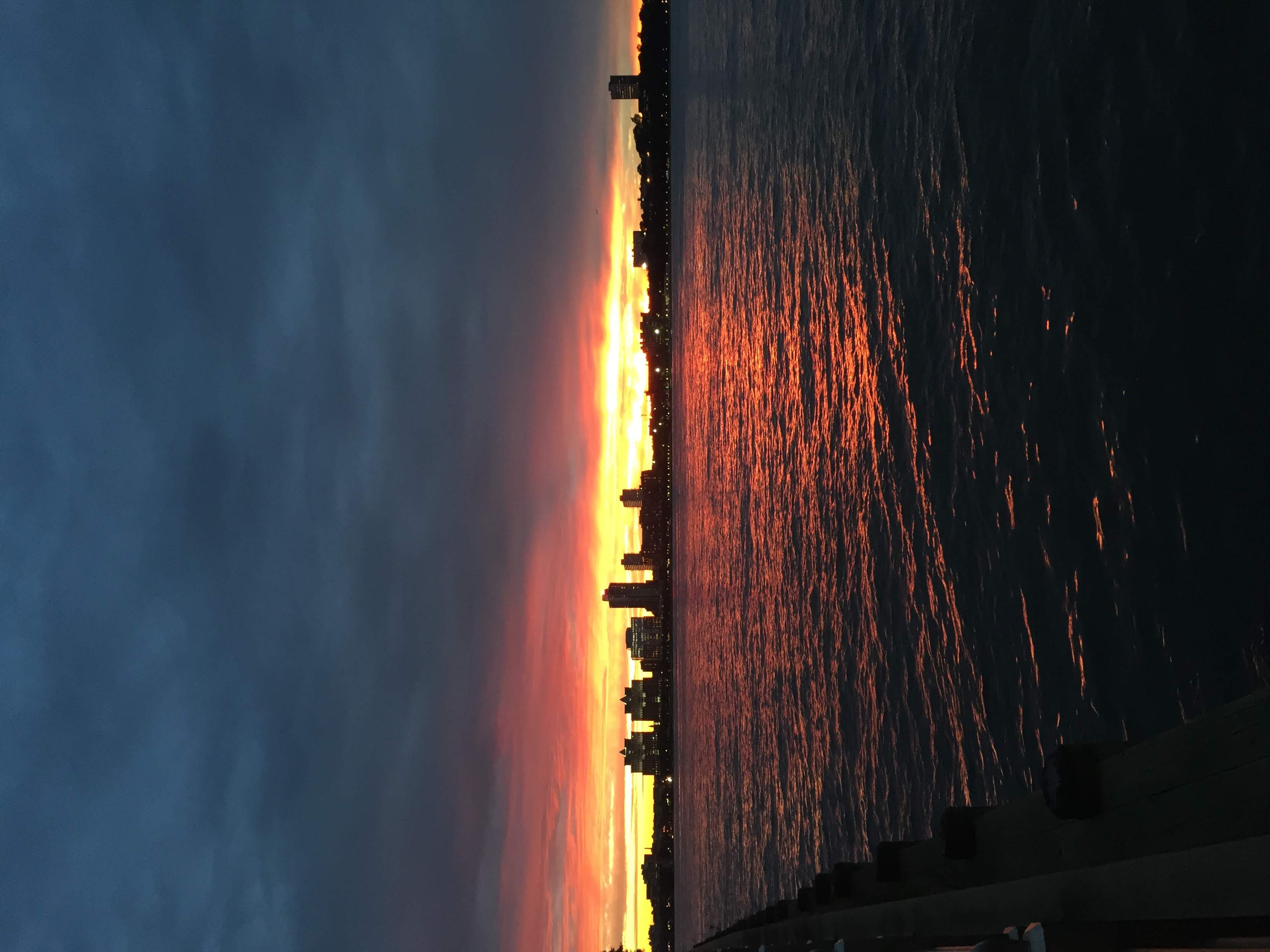 Vibrant, but clouded, Sunset over the Hudson River, West Village, NYC